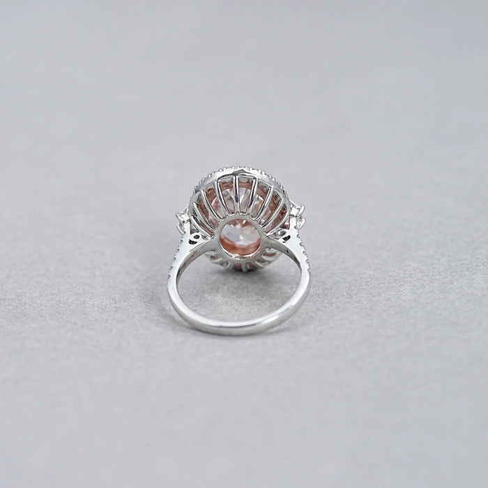 Trapezoid With Pink Oval Accent Halo Diamond Ring