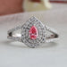 front view of pink pear cut diamond split double halo engagement ring