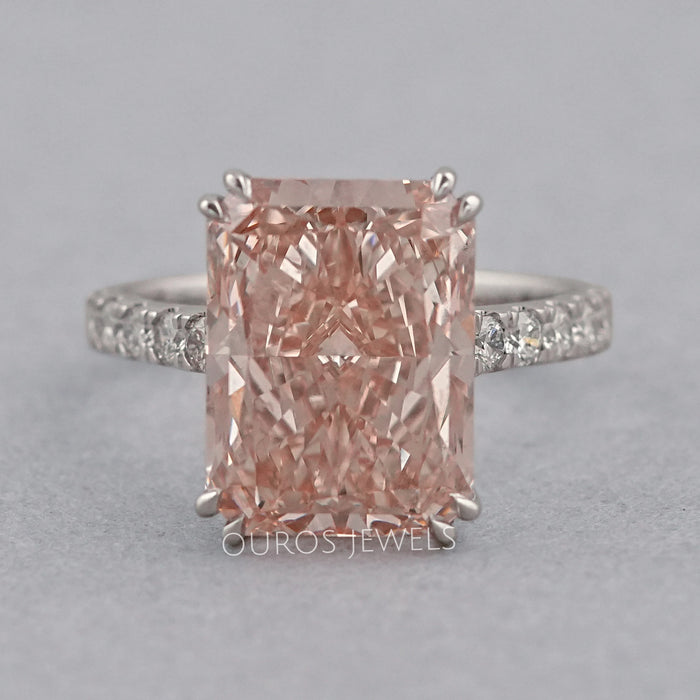 front view of pink radiant-cut diamond double-prong solitaire accent engagement ring