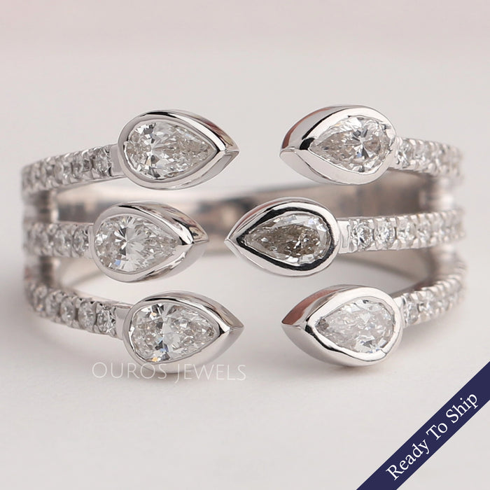 Dreireihiger offener Manschettenring mit birnenförmigem Diamanten