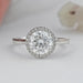 round brilliant cut lab diamond solitaire halo engagement ring's front view