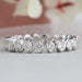 front view of round cut lab grown diamond eternity wedding band white gold