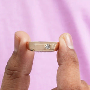 A Men holding Round Promisr Ring 