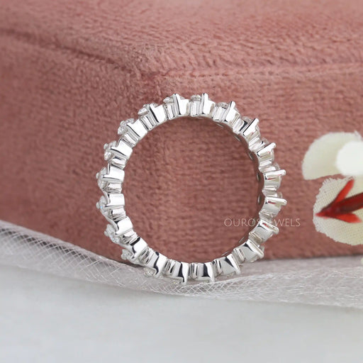 side view of round cut lab created diamond eternity band white gold