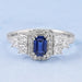 sapphire emerald diamond engagement ring with halo accent's front view