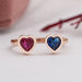 top view of sapphire and red ruby heart shape bezel set open cuff wedding ring