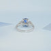back view of sapphire cushion gemstone with trapezoid diamond 3 stone wedding ring