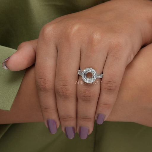 round-shaped lab diamond semi-mount halo engagement ring in finger