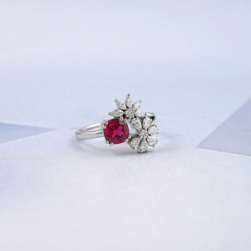 side view of cushion cut ruby with pear & marquise diamond split shank wedding ring