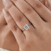 asscher cut diamond double prong engagement ring on model's hand