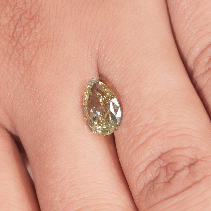 Yellow Modified Pear Cut Loose Diamond on Hand   