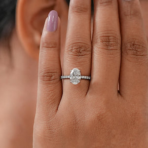 Oval Shape Solitaire With Accent Ring