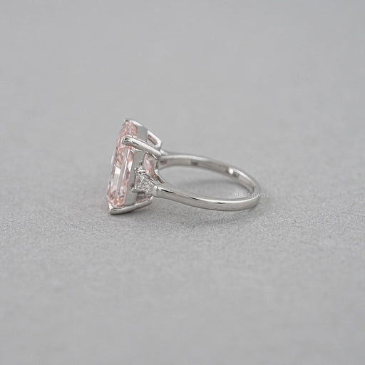 side view of pink radiant-cut lab diamond three-stone colored engagement ring