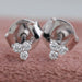 front view of trinity tiny round diamond push back stud earrings white gold 
