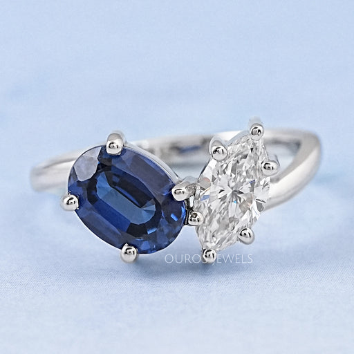 front view of sapphire oval & marquise diamond two stone toi et moi engagement ring
