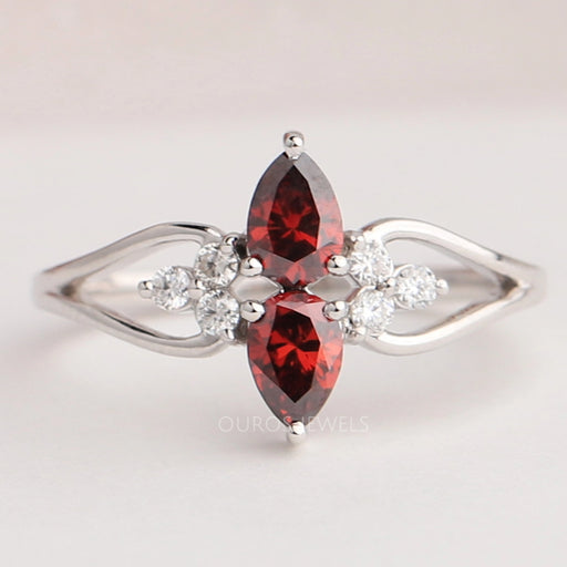 front view of red pear-cut lab diamond two-stone dainty colored wedding band