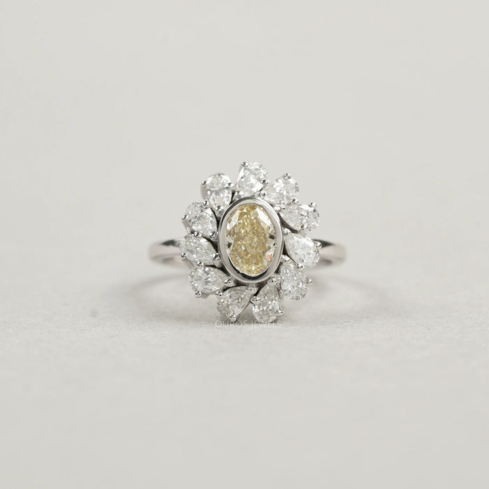 Yellow Oval Bezel Set Diamond With  Pear Halo Ring