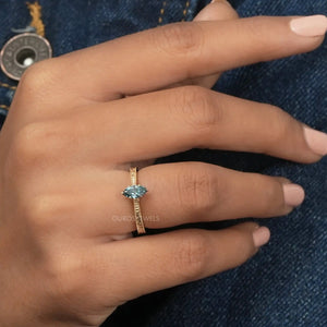 [A Women wearing Blue Marquise Cut Solitaire Ring]-[Ouros Jewels]