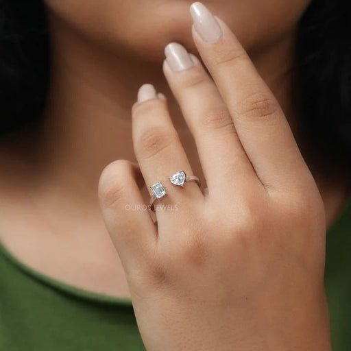 A Women wearing Heart and Emerald Diamond Wedding Ring