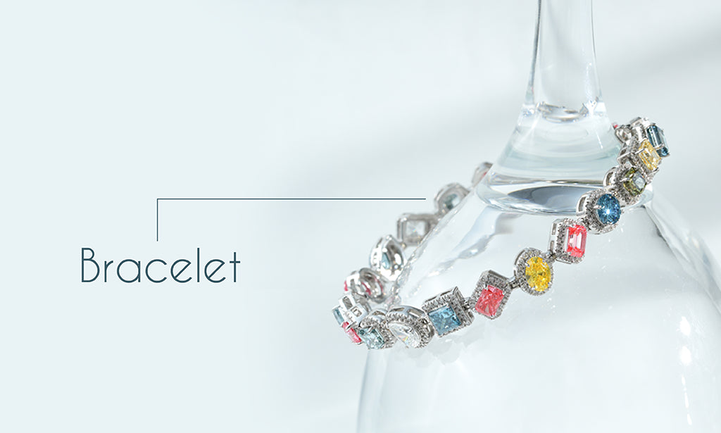  image Showing luxurious women's stackable tennis bracelet featuring emerald-cut lab-grown diamonds