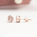 Bezel Set Diamond Stud Earrings in rose gold, featuring a secure screw back design and radiant round diamonds.