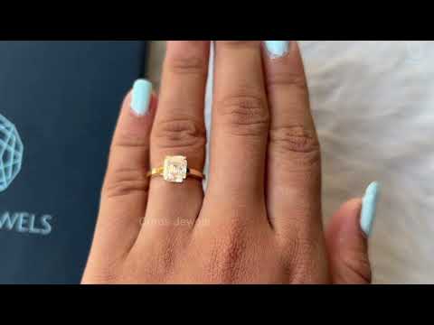 emerald cut diamond cathedral engagement ring