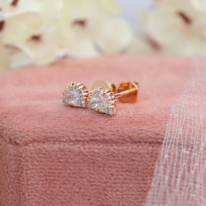 cadillac cut lab made diamond stud earrings rose gold on jewelry box