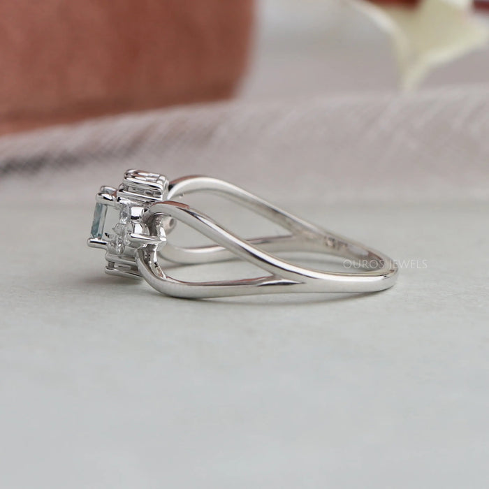 Side view of vintage asscher cut cluster diamond ring, this ring center diamond is Bluish Green.