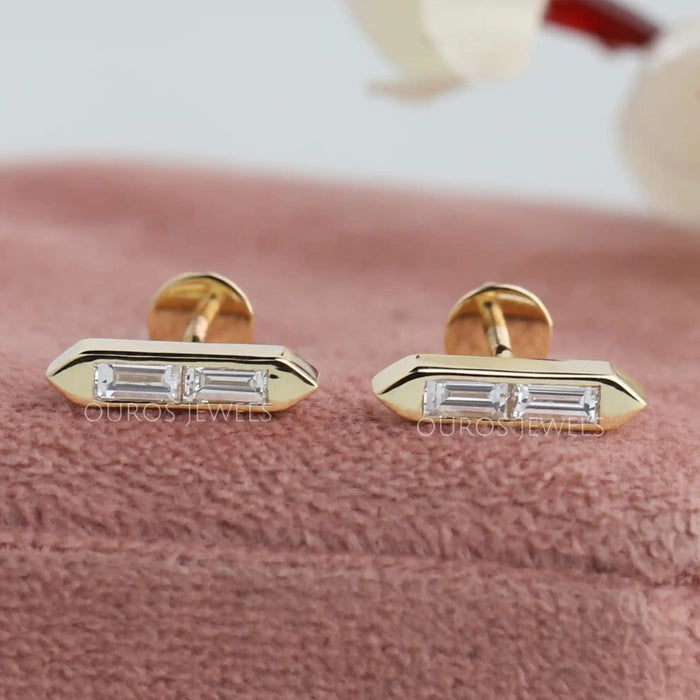 A pair of antique lab diamond stud earrings in solid gold