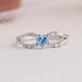 Created in 14K white gold, this design features a white diamond-accented infinity shape