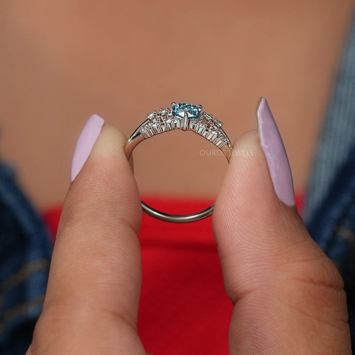 Framed from 14K white gold and adorned with a stunning blue heart-shaped lab created diamond