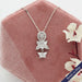 Butterfly cut lab grown diamond pendant with round, pear and oval diamonds in 14k white gold