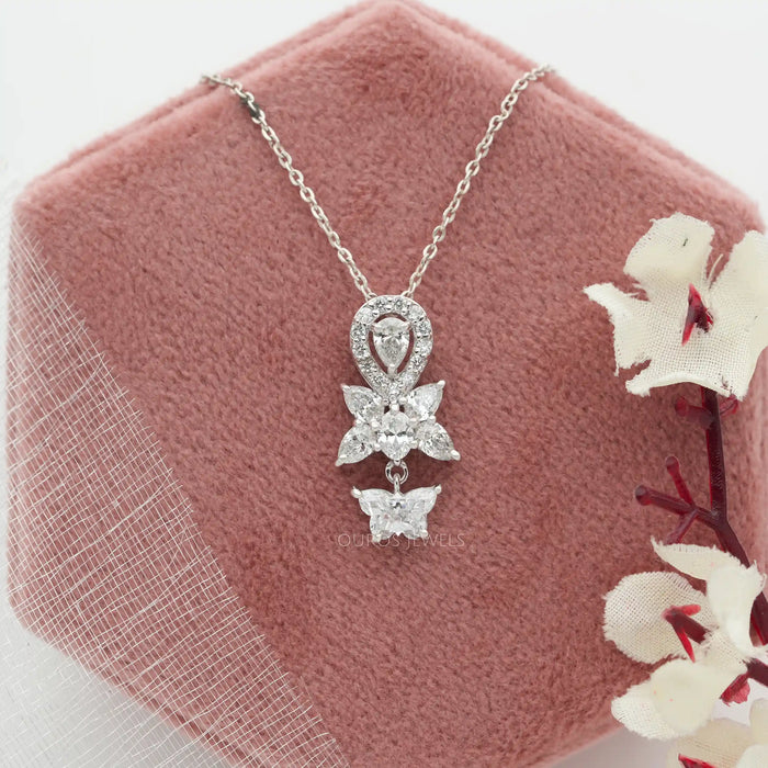 Multi shaped lab diamond pendant made with butterfly, pear, oval and round cut diamonds