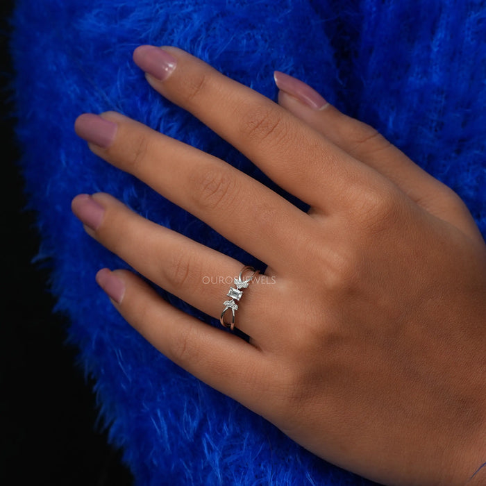 In finger front view of emerald cut cluster diamond ring a best way of express your feelings.