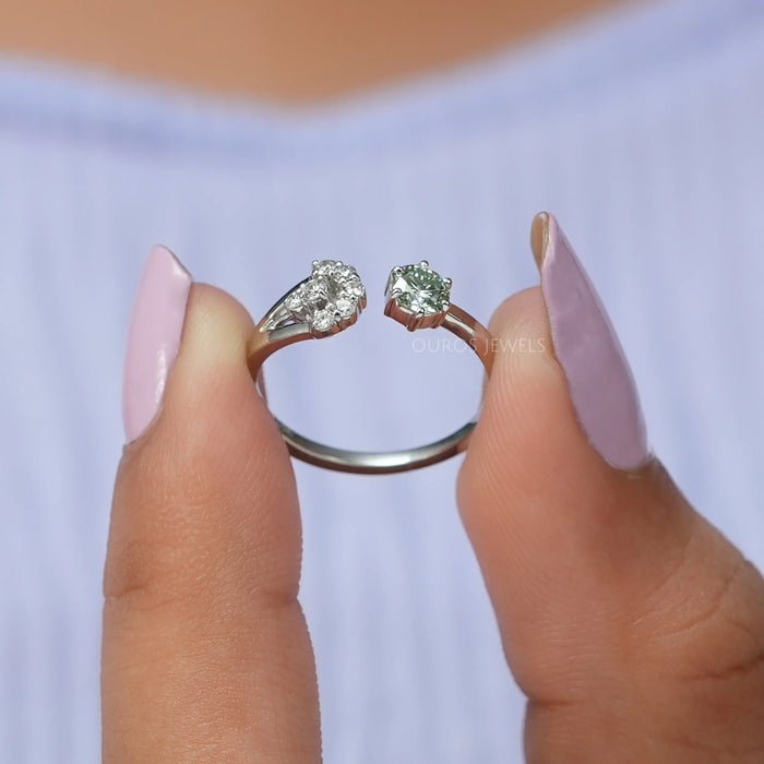 A close up look of fancy green round cut lab diamond engagement ring