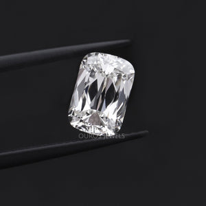 2.23 Carat IGI Certified Criss Cut Lab Diamond holding in between tweezer with dark gray background. 