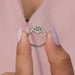 Round halo and accent stones studded on Asscher cut diamond engagement ring