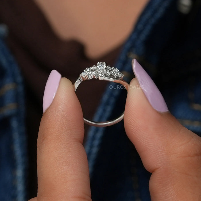 In finger side look of oval brilliant cut lab made diamond engagement ring