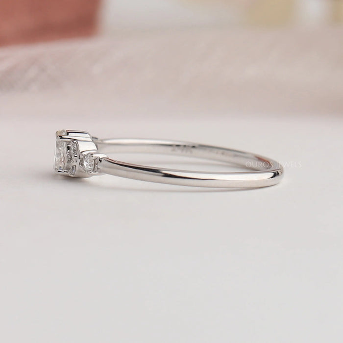 Side view of white gold lab diamond engagement ring crafted with Oval cut diamond