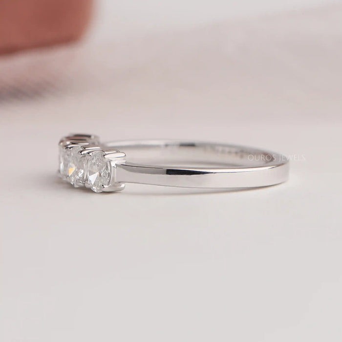 Side look of oval cut eco friendly diamond wedding band