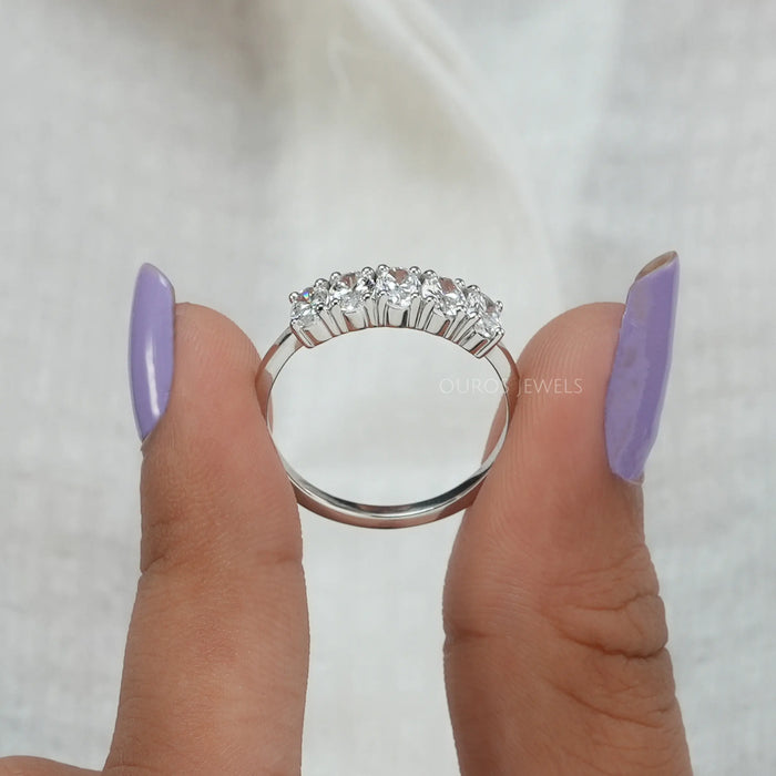 [A Women Holding Oval Five Stone Ring]-[Ouros Jewels]