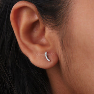 model wearing diamond bar earrings 