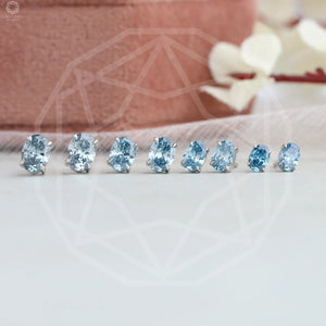 blue oval diamond earrings 