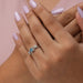 Fancy blue radiant lab created diamond infinity ring in finger