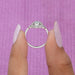 [A Women holding Oval Diamond Ring]-[Ouros Jewels]