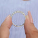 U prong diamond wedding band with emerald cut lab diamonds