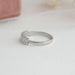 14k white gold band of emerald cut seven stone wedding band