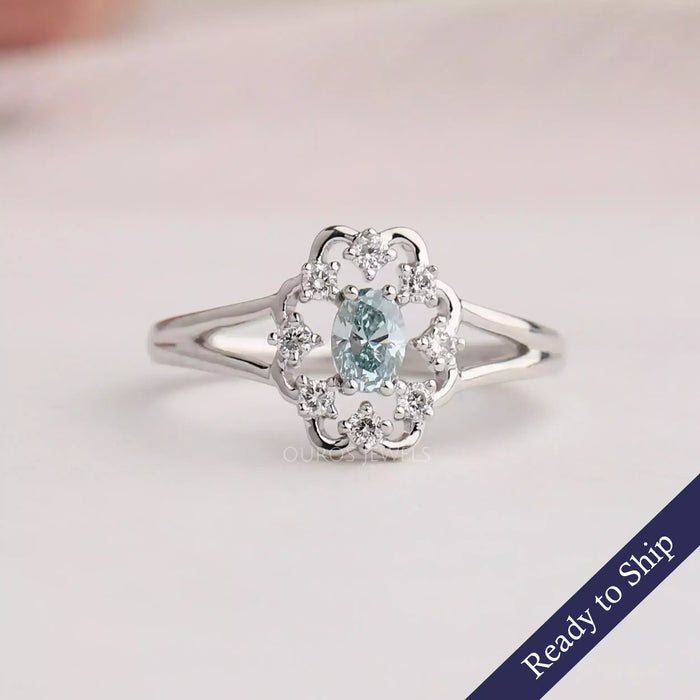 Font view of Oval Shaped Engagement Ring crafted with side rounded round diamonds in 14k white gold. 