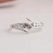 Front view of olive pear shaped diamond bypass ring. This engagement ring inspired by wedding ring.