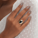 oval solitaire diamond engagement ring in black color 